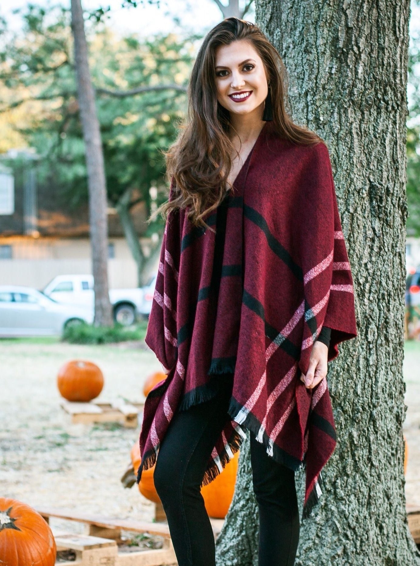 Poncho de cuadros rojos