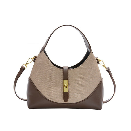 Crescent hobo bag in two-tone coffee with gold turn-lock