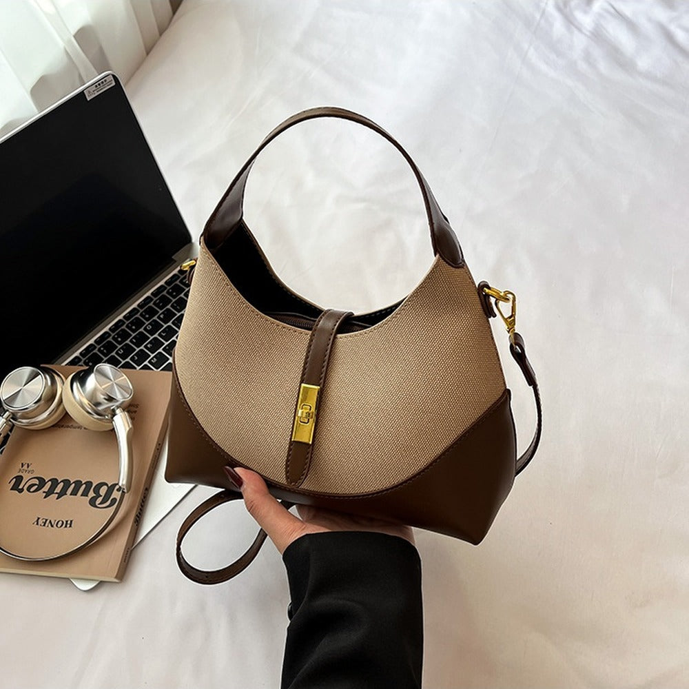 Coffee crescent hobo bag with crossbody strap attached