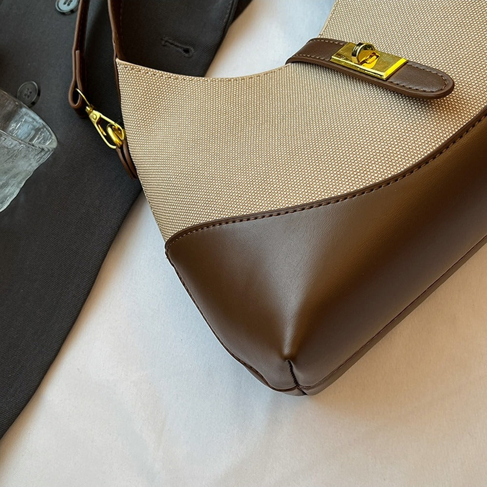 Faux leather base and textured upper of the hobo bag
