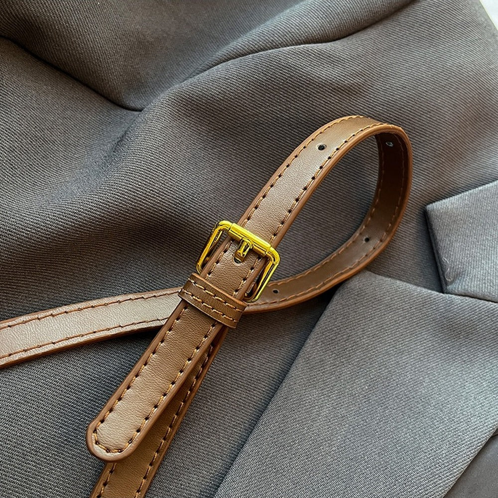 Adjustable crossbody strap with buckle