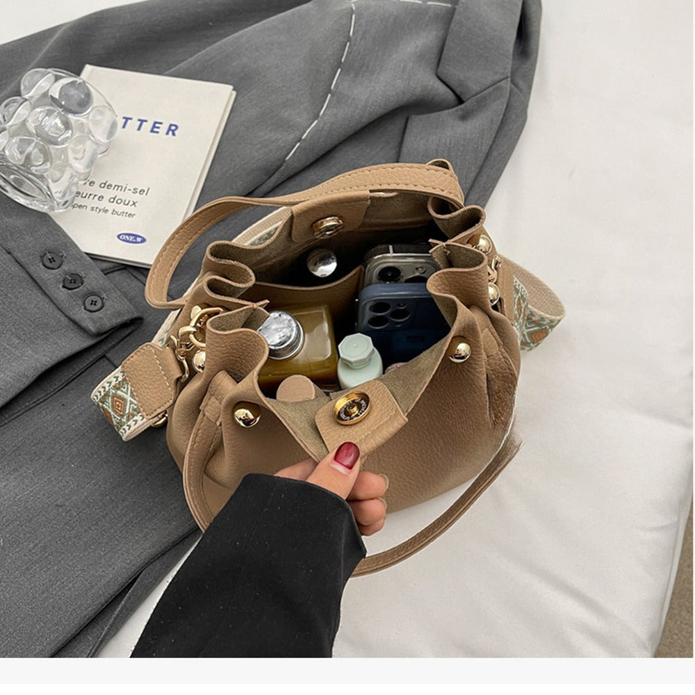 Roomy interior fits everyday essentials