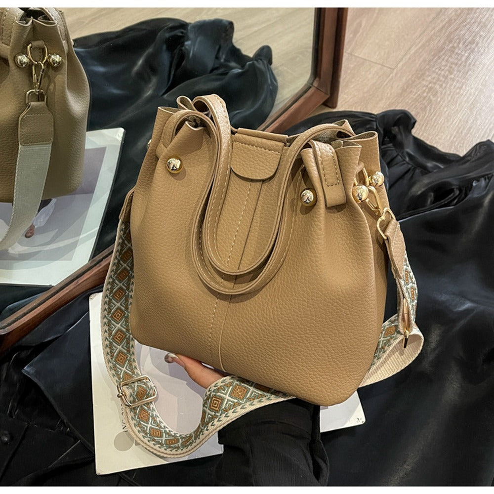 Khaki bucket bag with gold-tone studs