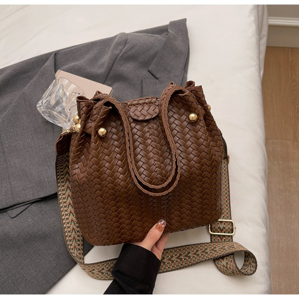 Woven Dark Brown bucket bag with top handles and wide crossbody strap