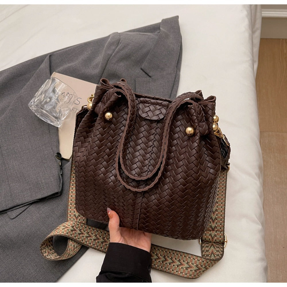 Woven Coffee bucket bag with top handles and wide crossbody strap